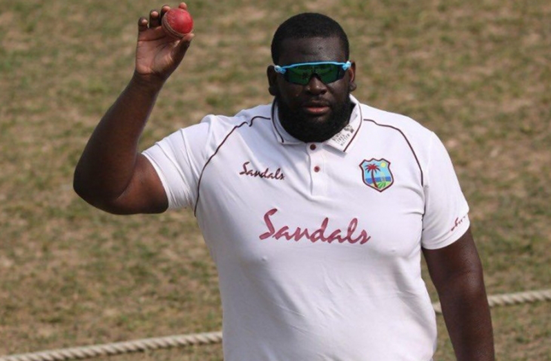 Off-spinner Rahkeem Cornwall celebrates his five-wicket haul yesterday.
