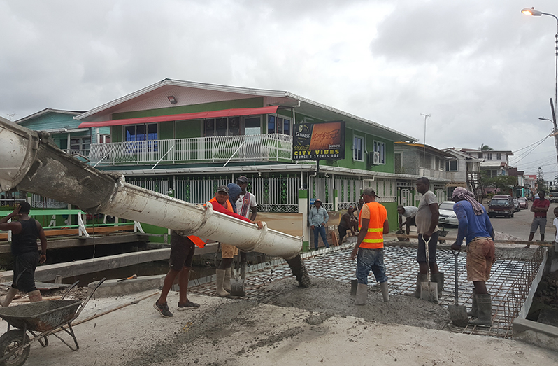 Work being done on the bridge at Hogg and Sussex Streets, Albouystown