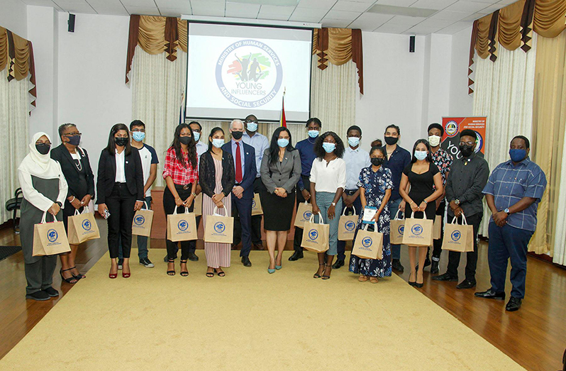 Minister of Human Services and Social Security, Dr. Vindhya Persaud and British High Commissioner (Ag), Mr. Ray Davidson along with some of the youths who will be participating in the ‘young influencers’ programme (DPI photo)