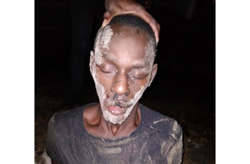 The suspected thief who was caught and beaten by residents