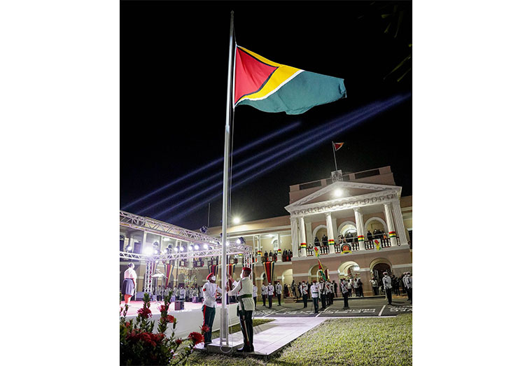 Patriotism soared as the Golden Arrowhead was hoisted on the eve of Guyana’s 51st Republic Anniversary. The flag-raising ceremony, accompanied by a cultural programme, was hosted at the Parliament Buildings on Brickdam, Georgetown, in the presence of members of the Government and the Diplomatic Corps (Latchman Singh photo)