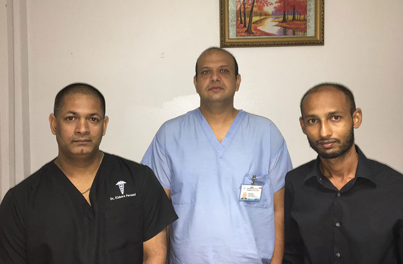 Dr. Kishore Persaud, Head of Department, Multi-Organ Transplant and Vascular Access Surgery at the Georgetown Public Hospital Corporation (left) and his team, Dr. Roy Samlall (centre) and Dr. Bolan Persaud