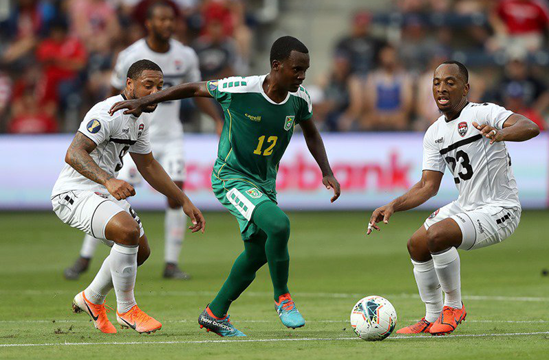 FLASHBACK! Guyana’s Pernell Schultz (#12) is in control of the ball in midfield against Trinidad at the 2019 CONCACAF Gold Cup. The game ended 1-1.