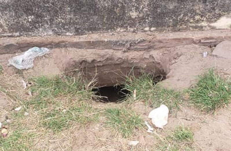 The three-foot hole that was dug by the prisoners
