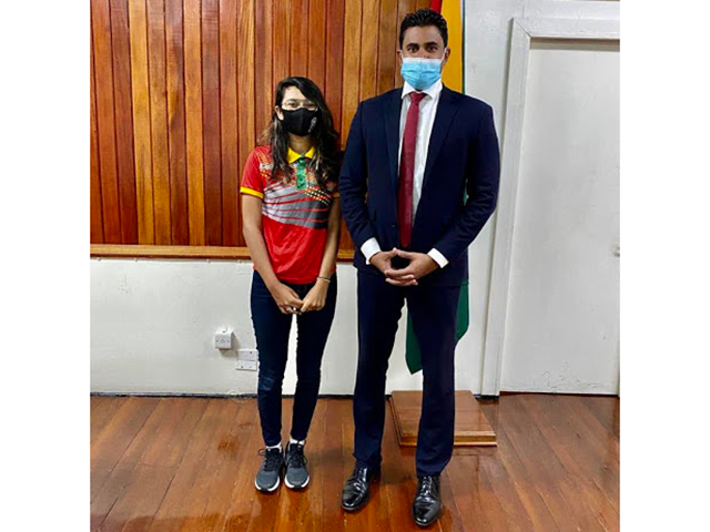 Women's National badminton champion Priyanna Ramdhani and Minister of Sport Charles Ramson Jr during her recent visit