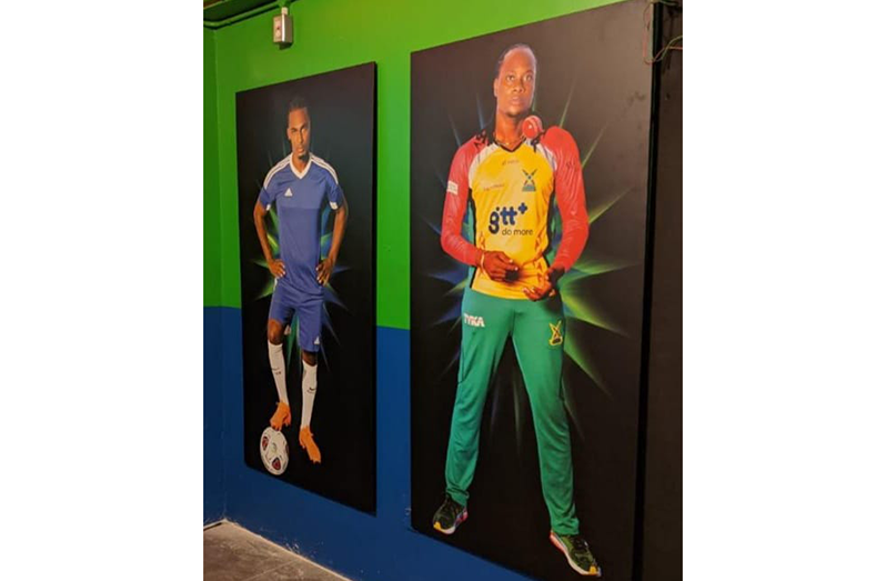 Life-size images of Gregory Richardson and Steven Jacobs mounted at the new Guyana Lottery Company Gaming Centre.