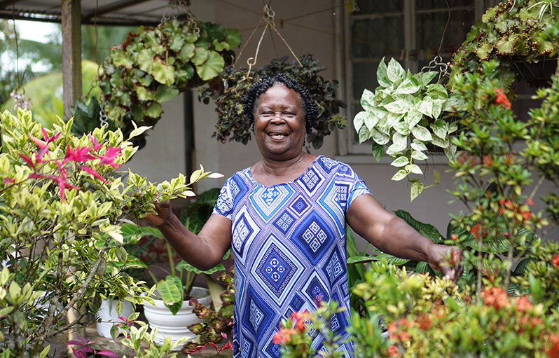 Yvonne Hope in her flower garden