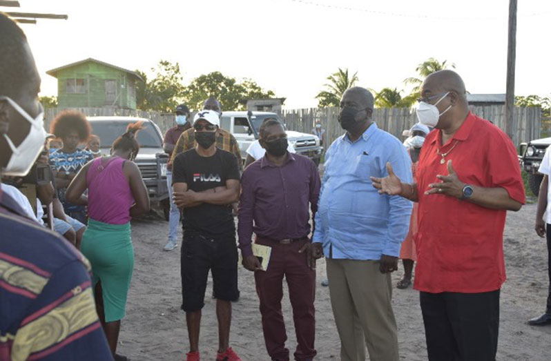 Prime Minister, Brigadier (ret’d) Mark Phillips, and Minister of Public Works, Bishop Juan Edghill during their meeting with the residents of Wismar (DPI photo)