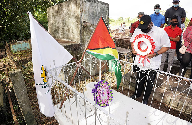 President Dr Irfaan Ali is about to lay a wreath at the grave of Kowsilla (Alice) at the Anna Catherina, West Coast Demerara burial ground in observance of her 57th death anniversary