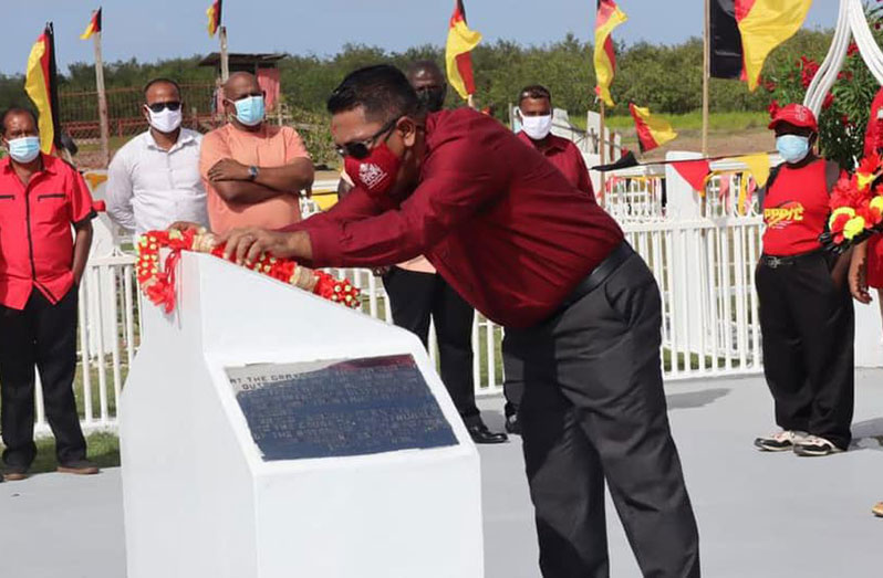 Minister of Agriculture Zulfikar Mustapha lays a wreath in remembrance of Dr. Cheddi Jagan at the Crematorium site at Babu Jaan, Port Mourant, on Saturday