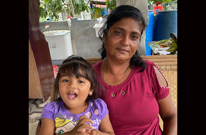 Sherifan Gafoor and one of her grandchildren