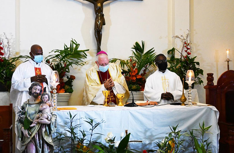 Fr Britto (new parish priest), Bishop Francis and Fr Montrose (Parish priest of Meadowbank) at the inauguration ceremony