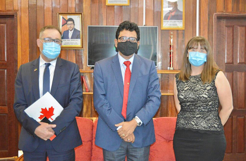 Attorney-General and Minister of Legal Affairs, Anil Nandlall, S.C (centre) with High Commissioner of Canada to the Co-operative Republic of Guyana, Mark Kevin Berman (left) and Counsellor, Development Cooperation, Canadian High Commission, Janine Cocker (right)