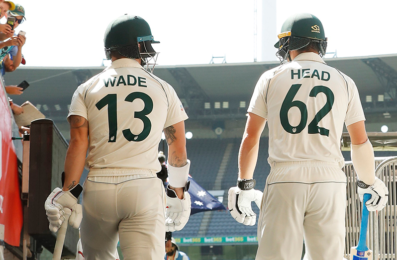 Matthew Wade (left) and Travis Head miss out on a national contract for 2021-22 season.