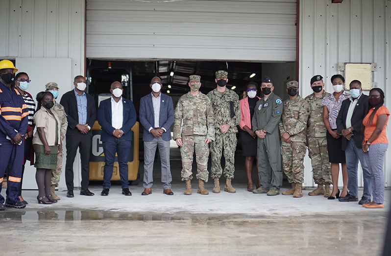 Lieutenant Colonel Kester Craig (seventh from left) stands next to Adjutant General of the Florida National Guard, Major General James Eifert. Also pictured are several high-ranking CDC staff and members of the Florida National Guard