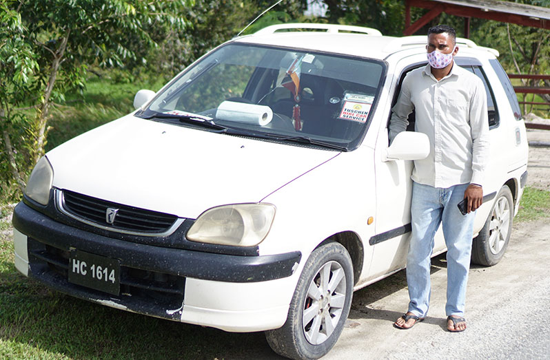 Suraj Dhanbeer poses by his taxi in Tuschen (Carl Croker photos)