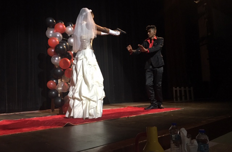 The bride learns that her groom is gay, so she pulls out a gun and shoots him, in this play at the National Cultural Centre (Photo by Francis Quamina Farrier)
