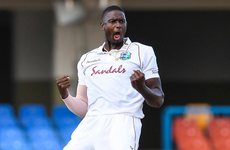 West Indies all-rounder Jason Holder celebrates after taking one of his five wickets on March 21, the opening day of the first Sandals Test match against Sri Lanka at the Sir Vivian Richards Stadium in Antigua. Holder claimed 5-27 to help the regional side dismiss the visitors for 169. (Courtesy CWI/Philip Spooner)