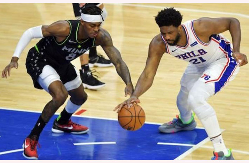 Joel Embiid (right) added eight rebounds, two assists and three blocks to his 24-point haul.