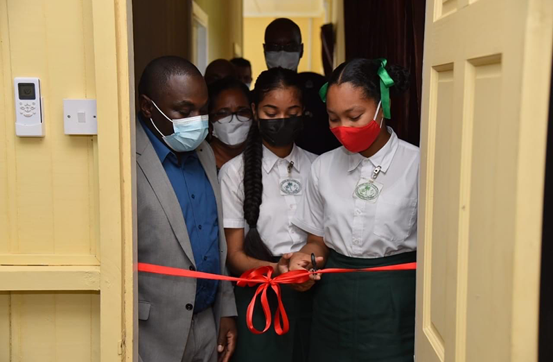 Minister Kwame Mc Coy oversees cutting of the ribbon to launch Radio Essequibo