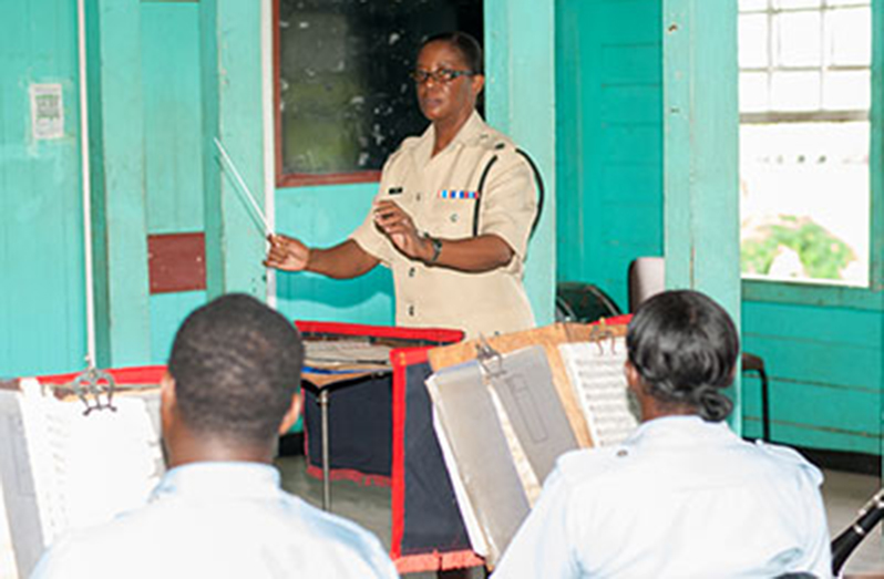 Superintendent Charmaine Stuart going through the paces with some members of the Police Force Band in 2016