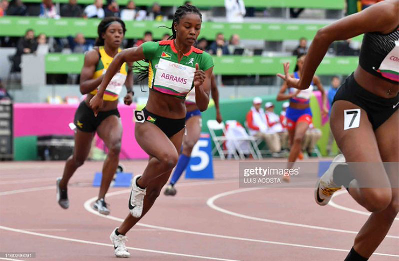 FLASHBACK! Guyana's Aliyah Abrams (wearing #6) competes in the Women's 400m semi-final during the 2019 Pan Am Games in Lima, Peru. (Photo: Luis Acosta/AFP/Getty Images)