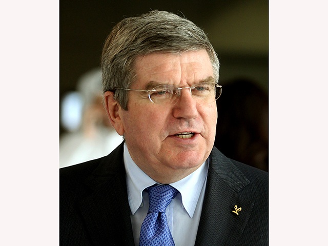 IOC President Thomas Bach will arrive 11 days ahead of the planned opening ceremony.
