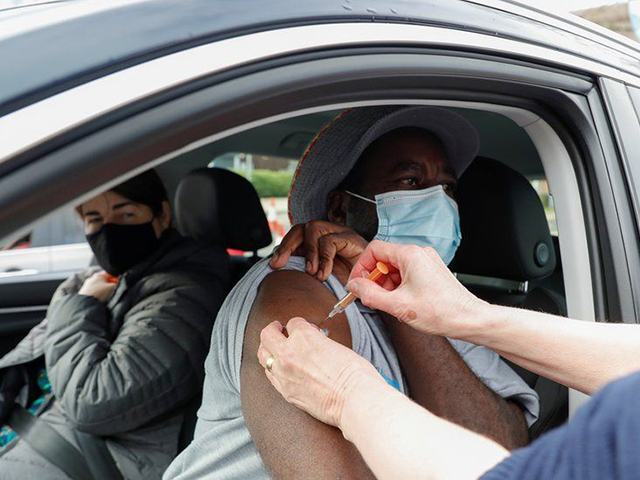A person being administered a jab at a similar ‘drive thru’ initiative (Reuters photo)