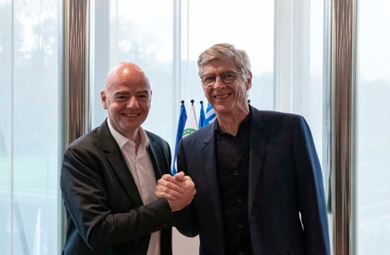 FIFA's chief of global football development Arsene Wenge (right) with FIFA president Gianni Infantino.(FIFA Image)