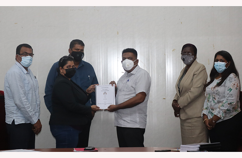 Minister Zulfikar Mustapha (third right) hands over contract documents to one of the company's representatives in the presence of other Ministry of Agriculture officials