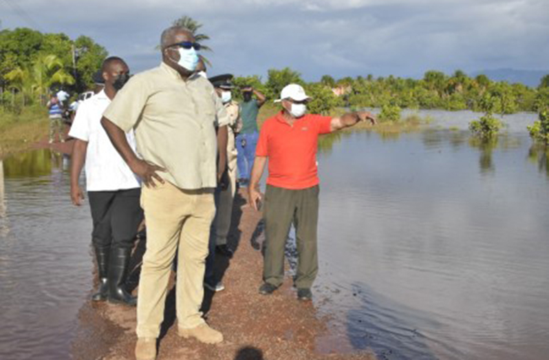 Prime Minister Brigadier (ret’d) Mark Phillips takes a first-hand look at the flooded areas in Region Nine