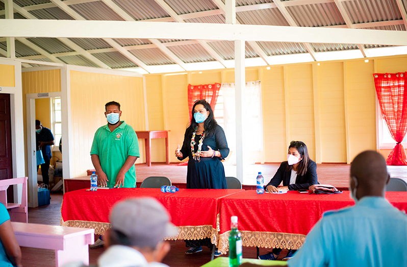 Human Services Minister, Dr. Vindhya Persaud (centre) addressing residents of Baramita last Tuesday, along with Permanent Secretary, Shannielle Outar and Toshao, Trevor Matheson