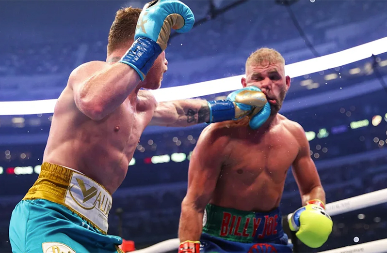 Canelo Alvarez  stopped Billy Joe Saunders to win super-middleweight bout as Brit 'busts eye socket',