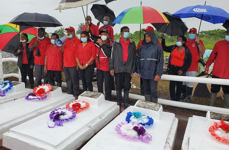 Members of the People’s Progressive Party Civic (PPP/C) on Wednesday at the Enmore Martyrs Gravesite, Le Repentir Cemetery, Georgetown.