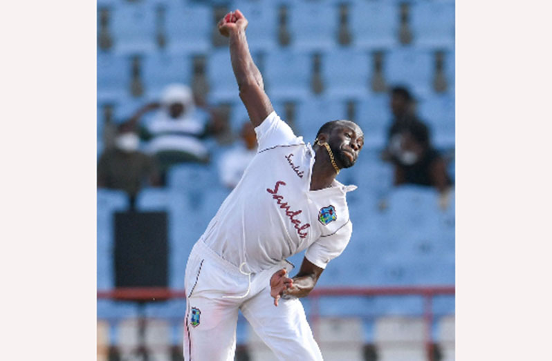 Fast bowler Kemar Roach sends down a delivery during his four-wicket haul on Sunday’s third day of the second Test. He finished with four for  52.