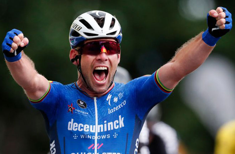Mark Cavendish celebrates his first Tour de France stage win since 2016 as he
sprinted to an emotional victory in Fougeres.