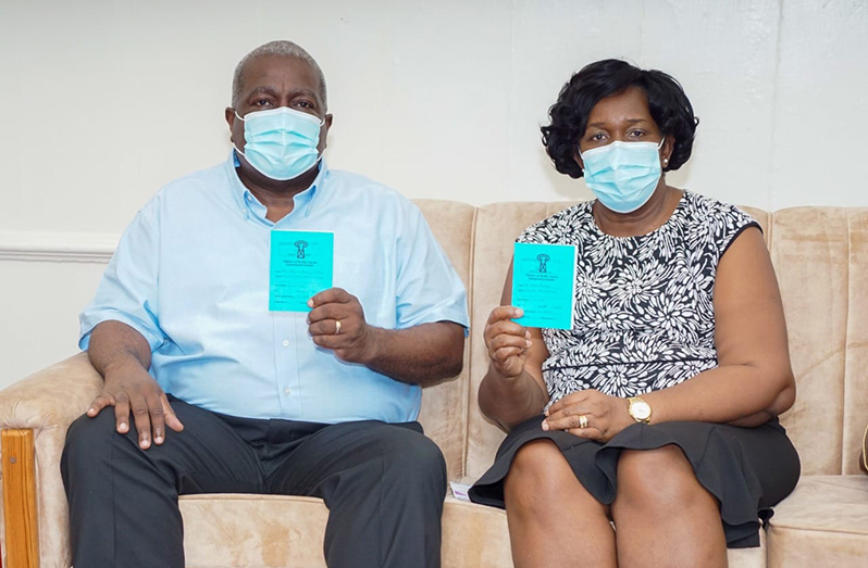 Prime Minister (PM) Brigadier (ret'd), Mark Phillips and his wife, Mignon Bowen Phillips are fully immunised