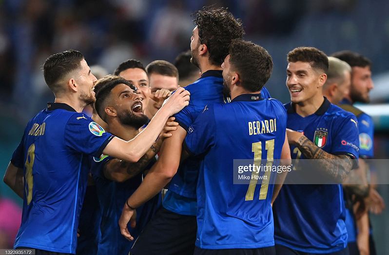 Manuel Locatelli (c) of Italy is congratulated on scoring the first goal, by Jorginho, Lorenzo Insigne, Domenico Berardi and Giovanni Di Lorenzo during the UEFA Euro 2020 Championship Group A match between Italy and Switzerland at Olimpico Stadium yesterday in Rome, Italy. (Photo by Mike Hewitt/Getty Images)