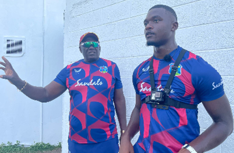 Teenager Jayden Seales (right) gets advice from West Indies bowling coach, Roddy Estwick. (Photo courtesy CWI Media)