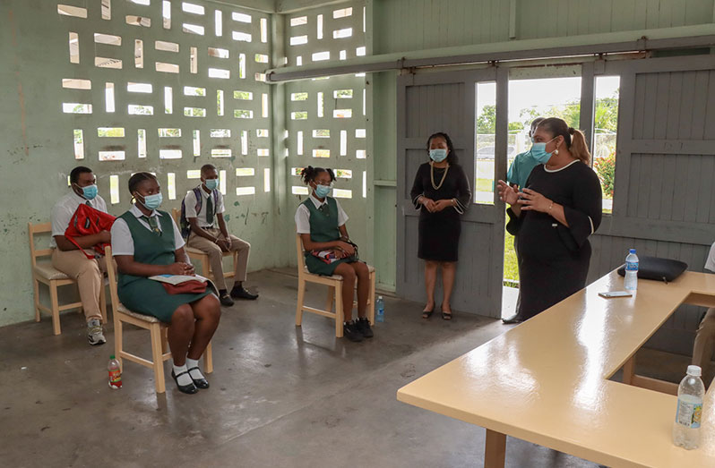 Minister of Education, Priya Manickchand, engaging students of the Richard Ishmael Secondary School on Monday  
(Ministry of Education Photos)