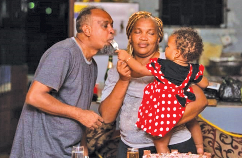 Adrian Narine celebrating a recent event with his granddaughter and wife