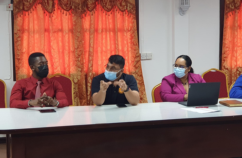 GTA’s Deputy Director, Kamrul Baksh, makes a point to the regional officials during the meeting. Also pictured are Personal Assistant to the Tourism Minister, Levi Carrington (left) and GTA’s Research Assistant, Amrita Naraine