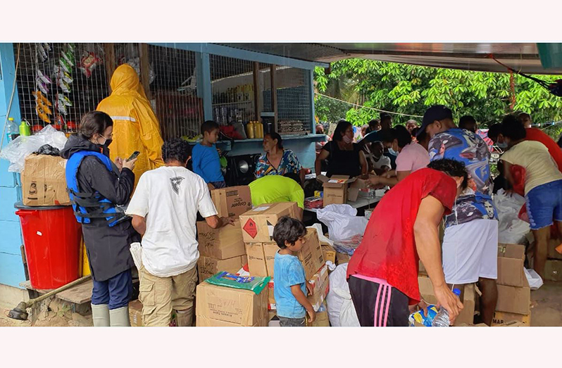 Relief supplies being unpacked for distribution to Region 7 residents (RDC photos)