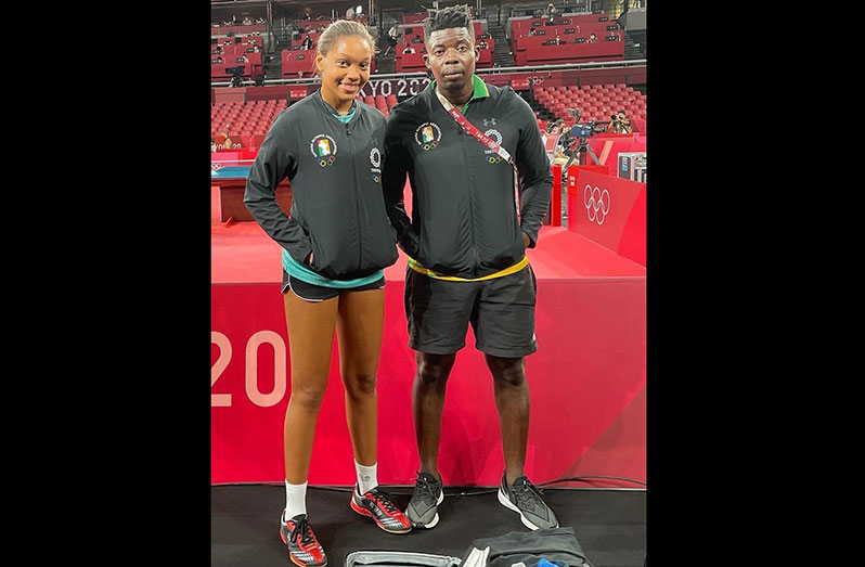 : Chelsea Edghill (L) and her Coach Idi Lewis after wrapping up competition at the Tokyo Olympics.