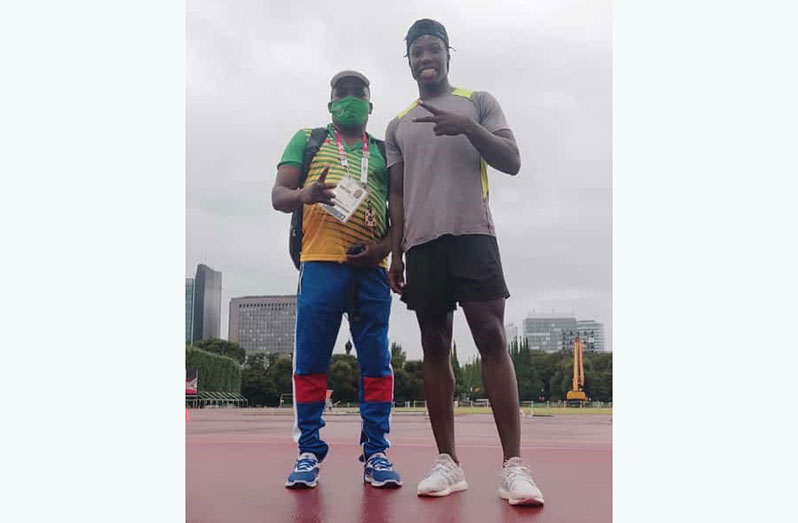 Coach Julian Edmonds and sprinter Emanuel Archibald in Tokyo, Japan