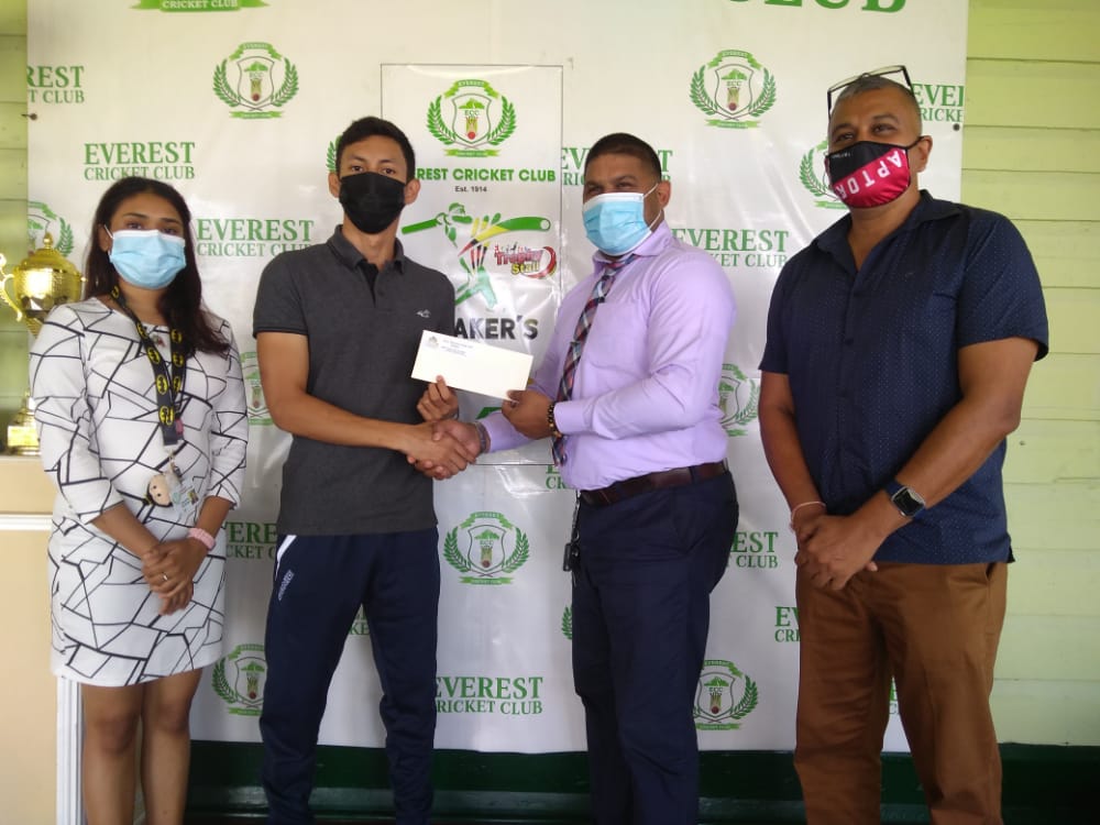 Miguel Wong (second left) collects the sponsorship from ECC member Javid Khan in the presence of other club officials, Ramdeo Kumar (right) and Krista Norton.