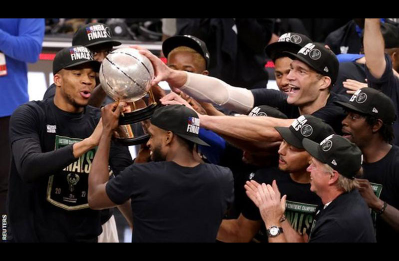 Giannis Antetokounmpo (left) missed the last two games for the Bucks but they still managed to win both.