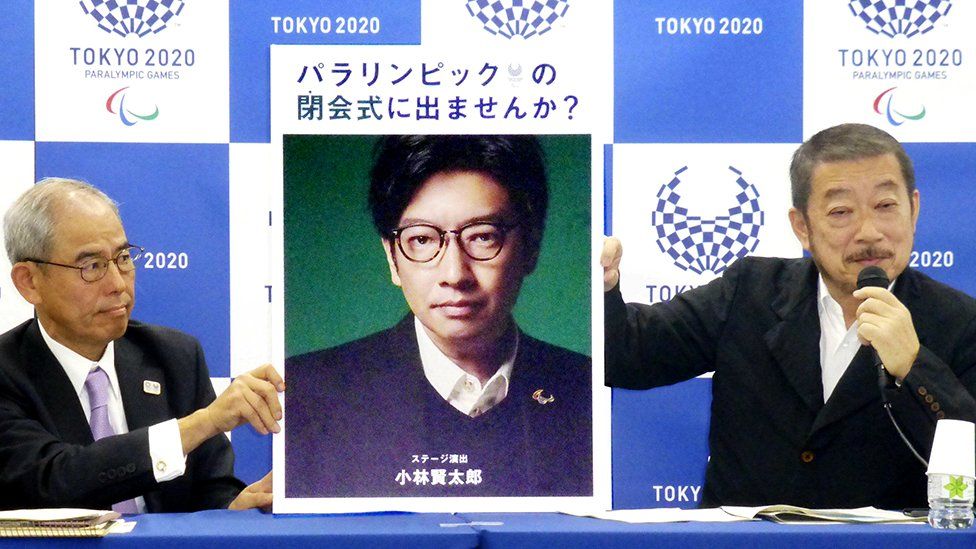 A photo of Kentaro Kobayashi is held up in 2019 by Tokyo 2020 organisers.