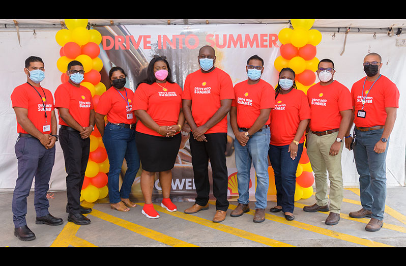 Sales Executive of Shell Service Stations, Renée Armstrong-Joseph (centre, left) and General Manager of SOL Guyana, Earl Carribon (centre, right), along with other members of the SOL Guyana team (Delano Williams photo)