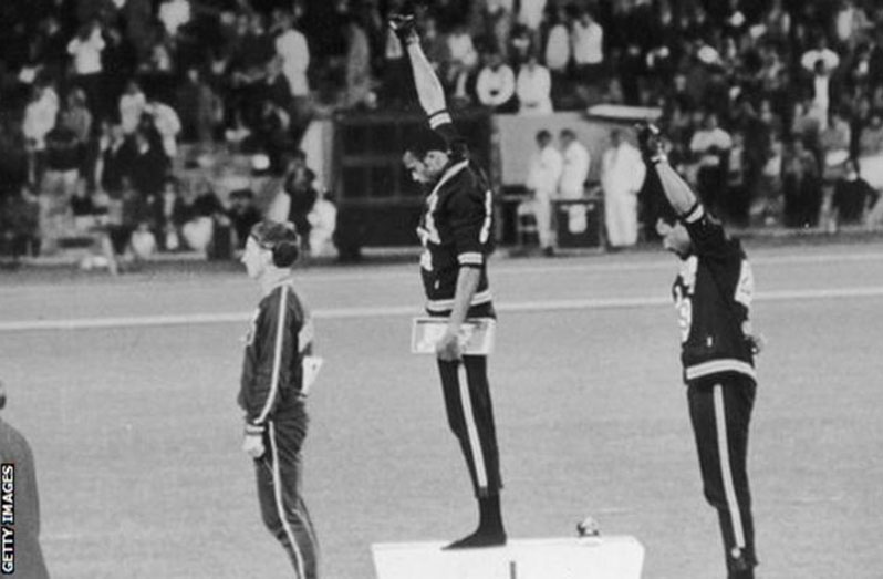At the 1968 Olympics, American athletes Tommie Smith and John Carlos protested on the podium against the ongoing civil rights issues in the USA at the time. Australia's Peter Norman, left, wore an Olympic Project for Human Rights badge in support of Smith and Carlos.